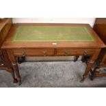 Edwardian writing table with gilt tooled green leather top