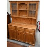 A stained pine dresser