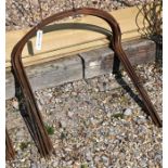 A bundle of ten medium curved weathered steel plant supports, 60 cm x 56 cm