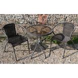 Rattan and glass terrace table and two chairs