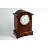 An Edwardian Barraud & Lunds London walnut cased mantel clock