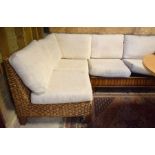 A hardwood and woven banana leaf corner sofa