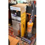 A Dyson light ball multi-floor vacuum cleaner with box