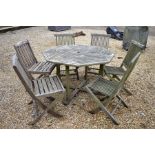 Weathered teak dining table and six chairs