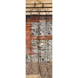 A pair of weathered steel arrow head garden obelisks, 216 cm x 34 cm