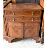 A reproduction walnut side cabinet