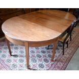 A 19th century mahogany D-end dining table