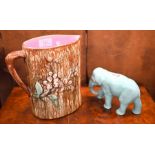 Majolica jug and celadon-glazed elephant