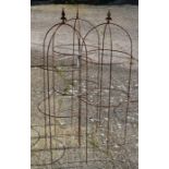 A trio of weathered steel arrow head garden obelisks,129 cm x 45 cm