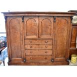 A large Victorian mahogany compactum wardrobe