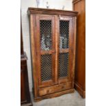 An Indian style stained hardwood cabinet