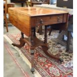 A 19th century mahogany drop leaf table with end drawer