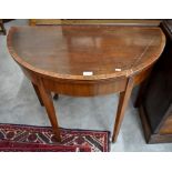 A 19th century mahogany crossbanded demi-lune card table