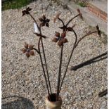 Five floral cast weathered steel garden stakes, 130 cm