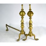 A large pair of 19th century brass baluster fire-dogs