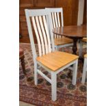 A set of four modern duck egg blue and white part painted slat back dining chairs