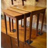 A mid century G-Plan style nest of three teak occasional tables