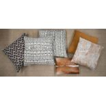 Three Oka cushions and three hide cushions (6)