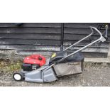 A Honda HRB425C petrol lawn mower