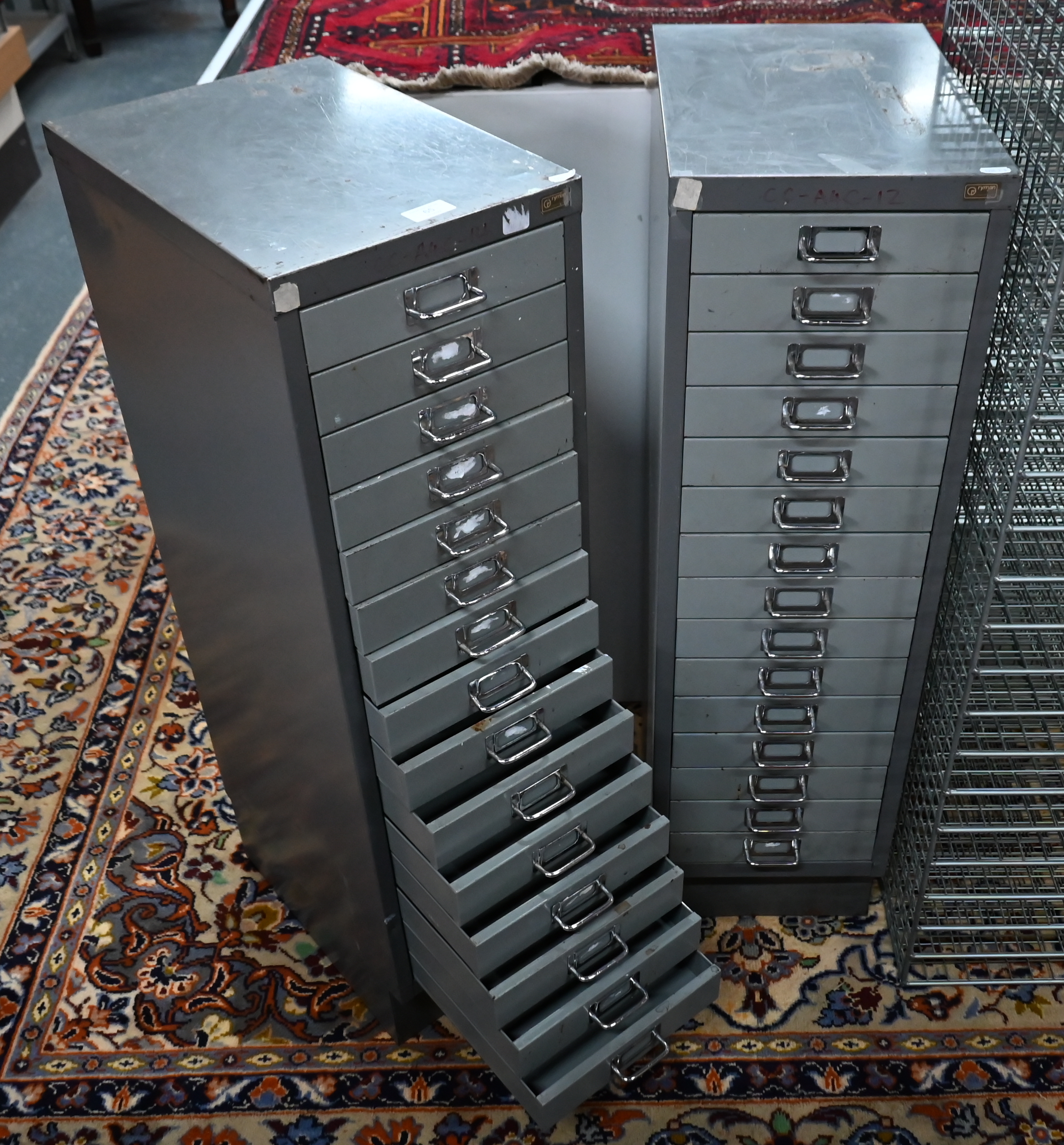 A pair of Ryman two tone grey metal 15-drawer filing cabinets