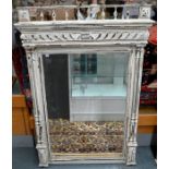 A vintage French off-white distress painted mirror