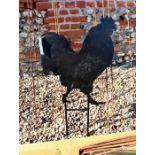 A black painted steel garden feature silhouette of a cockerel