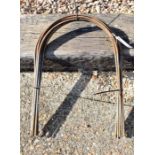 Ten weathered steel garden hoops, approx 52 cm h x 37 cm w