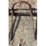 Ten weathered steel curved garden plant frames, approx 95 cm h x 37 cm w