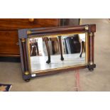 An antique rosewood framed overmantel mirror