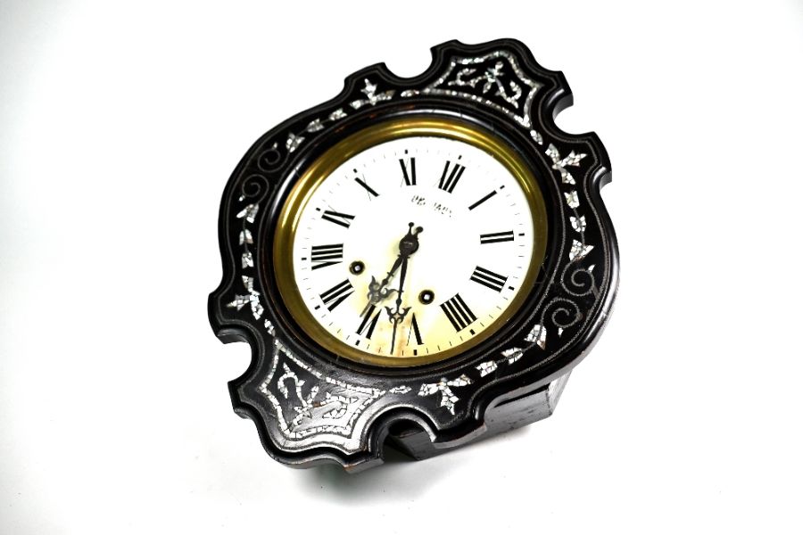 Dechaux - a French mother of pearl inlaid ebonised twin train wall clock