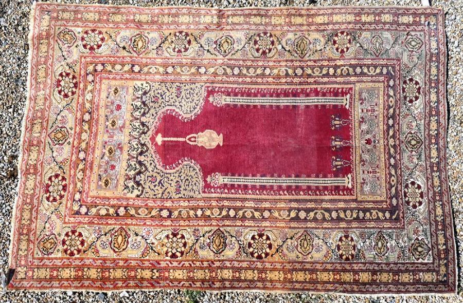 An antique Anatolian Mihrab design prayer rug