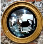A Victorian gilt framed convex mirror