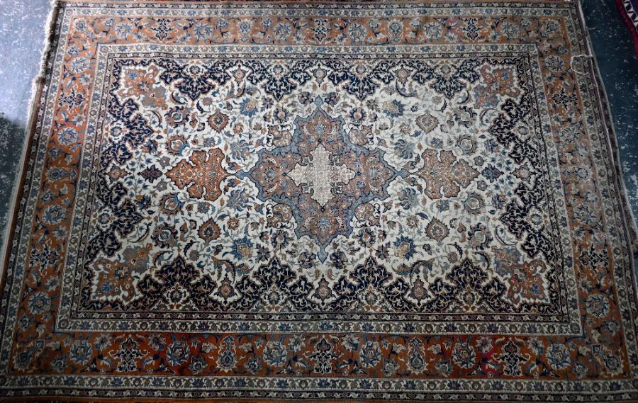 A large and fine antique Persian Kashan carpet