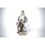 A Continental porcelain reticulated pot pourri vase and cover