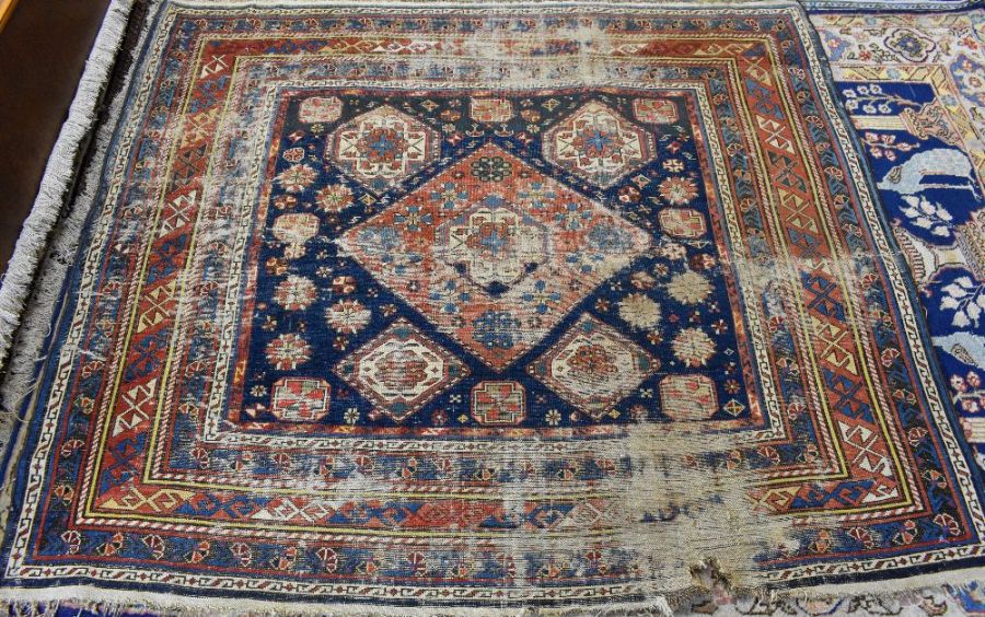 A blue ground Caucasion kazak design rug (heavily worn)