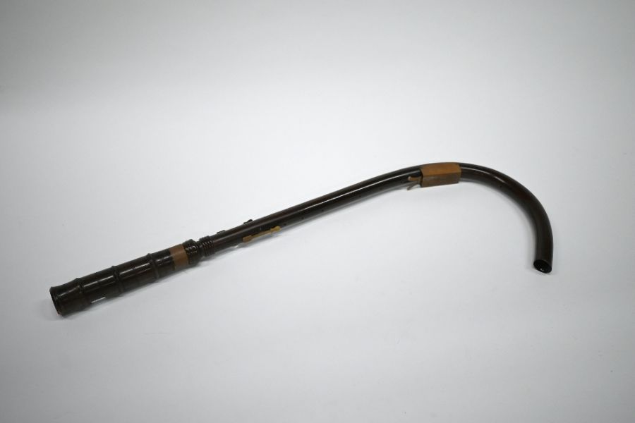 A Moech wooden replica crumhorn with curled end