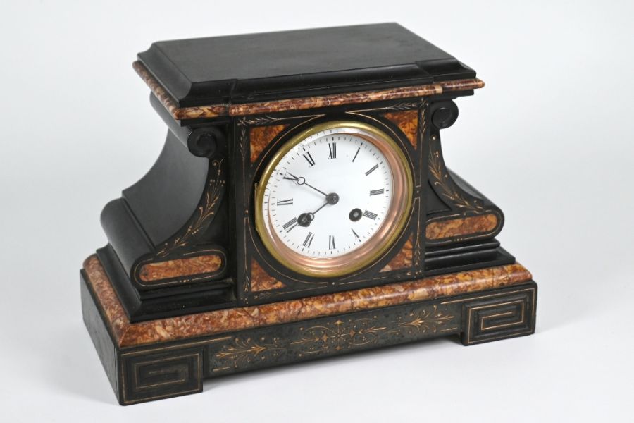 A late Victorian slate/marble mantel clock