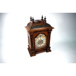 An Edwardian oak cased mantel clock with 8-day two train movement