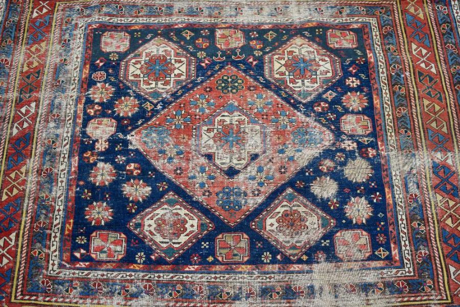 A blue ground Caucasion kazak design rug (heavily worn) - Image 5 of 7