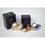 Two boxed Royal Crown Derby paperweights