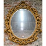 A giltwood mirror in the Baroque style