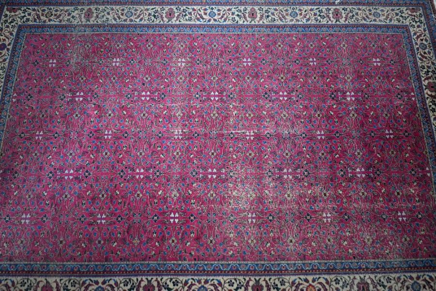 An old Persian Tabriz carpet