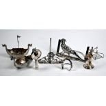 Novelty silver menu holders, trumps-picker and Viking boat condiments