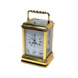 L'Epee, a contemporary French lacquered brass calendar carriage clock