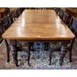 A large Victorian oak extending dining table