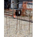 Pair weathered steel dumpy ball head obelisks