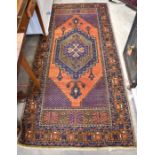 A Persian Baluchi rug