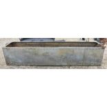 Large rivetted galvanized trough