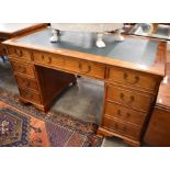 A hardwood twin pedestal desk by Brights of Nettlebed