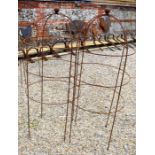 Pair weathered steel dumpy ball head obelisks